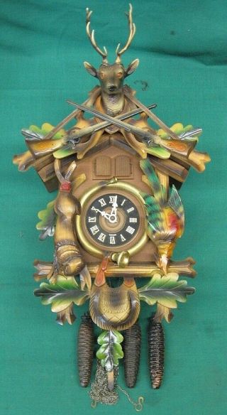 German Hagos Hrasting Swiss Musical Carved Hunter Cuckoo Clock
