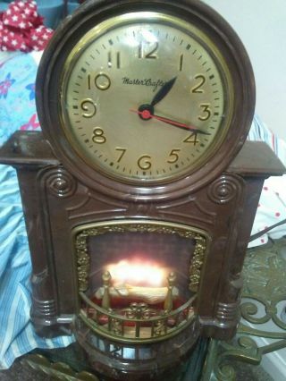 Vintage Mastercrafters Animated Flame Fireplace Clock Brown Plaztic 272