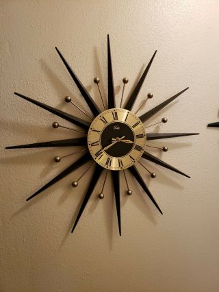Antique Welby Starburst Clock With Matching Candle Holders