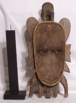 20th Century Senufo carved wooden Kpelie Double faced mask on stand 6