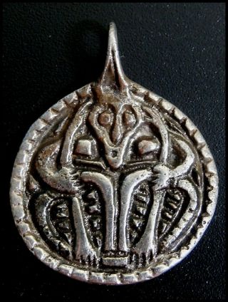 Extremely Fine Norse Viking Era Silver Discoid Theriomorphic Pendant