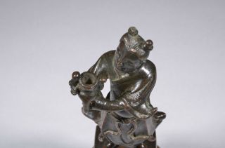 Antique Chinese bronze figural incense stick holder,  Ming dynasty. 8