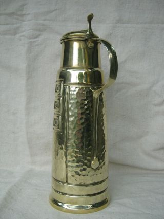 Stunning 37cm art - nouveau brass claret jug,  signed ISIS 4281.  Osiris Orivit WMF 2