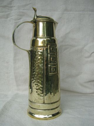 Stunning 37cm art - nouveau brass claret jug,  signed ISIS 4281.  Osiris Orivit WMF 3