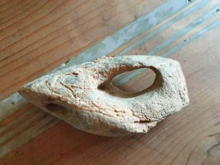 weird prehistoric artifact fossil tool found in a cave dinosaur bone neanderthal 2