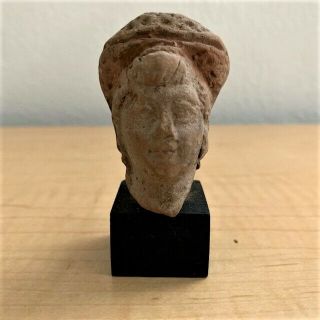 Roman Egypt Terracotta Head Of A Woman On Wooden Stand