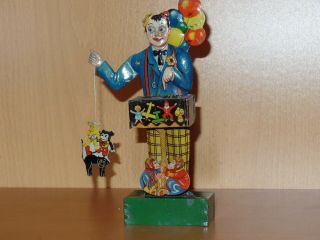 Antique German Tin Wind - Up Balloon Vendor.  Perfectly