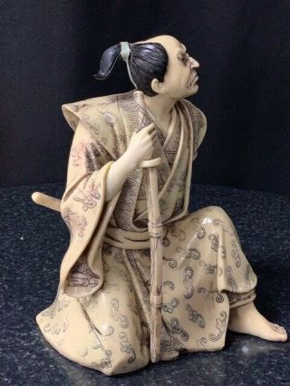 ANTIQUE CHINESE SAMURAI FIGURE.  IVORY COLOURED 9inch tall 5