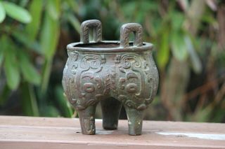 Antique Chinese Qing Dynasty Bronze Tri Footed Handled Vessel Taotie Mask Ding