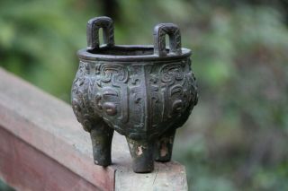 Antique Chinese Qing Dynasty Bronze Tri Footed Handled Vessel Taotie Mask Ding 4