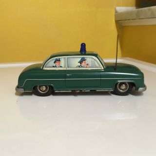 VINTAGE BLOMER & SCHULER TIN,  BATTERY OPERATED POLICE CAR.  FULLY OPERATIONAL 5
