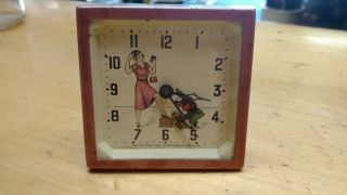 The Lux Clock Mfg.  Mechanical Alarm Clock Shoe Shine Boy W/ Lady