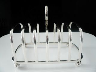 Large Silver Toast Rack,  London 1937,  Harrods Ltd (Richard Woodman Burbridge) 4