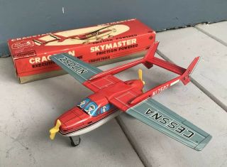 Vintage Japan Cragstan Cessna Skymaster Tin Friction Toy Airplane