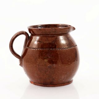 19th c.  large redware handled pitcher,  slip glazed with kiln spotting [11813] 2