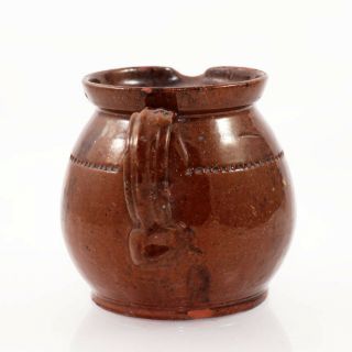 19th c.  large redware handled pitcher,  slip glazed with kiln spotting [11813] 3