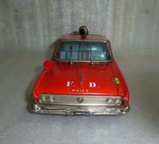Vintage toy T.  N.  Fire chief car friction no.  one.  Made in Japan in the 1950s 6