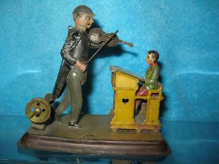 Becker Violinist & Student Tin Painted & Litho Steam Engine Toy " Articulated "