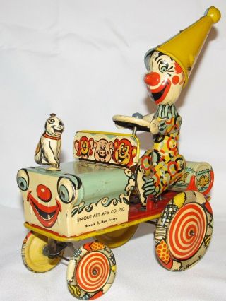For 2 Antique Tin Toys - - Unique Art Artie The Clown & Marx Coo - Coo Car