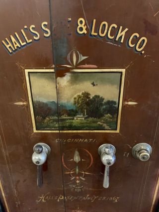 hall’s safe and lock co,  34 inches x36 inches x 62 inches tall,  paint good 5