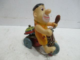 FRED FLINSTONE ON TRICYCLE WIND UP - - 2