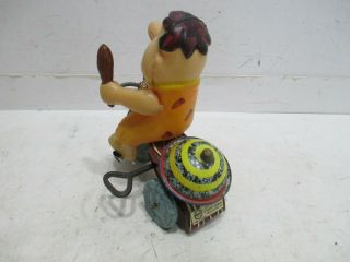 FRED FLINSTONE ON TRICYCLE WIND UP - - 4