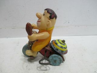 FRED FLINSTONE ON TRICYCLE WIND UP - - 5