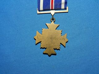 WWII - Vietnam Flying Cross Medal,  Named to: L.  S.  Swanson (C35) 4