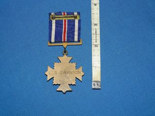 WWII - Vietnam Flying Cross Medal,  Named to: L.  S.  Swanson (C35) 5