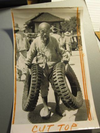 Korean War Press Photo Old Korean Man Carries Tires For Troops 1950