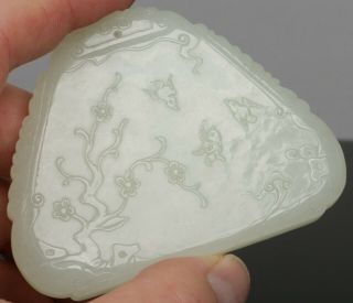 A Chinese Carved Pale Celadon Jade Chime Of Triangular Form