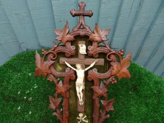 Mid 19th Black Forest Wooden Oak Wall Mounted Crucifix,  Font C1860s