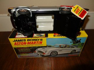 Pristine to James Bond Aston Martin Battery Operated w/Original Box. 11