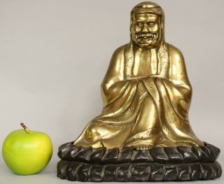 A Chinese Bronze Gilt Figure Of Bodhidharma Daruma Arhat,  Wood Stand 19th/20thc