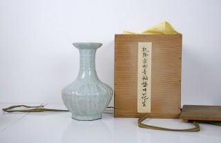 A Celadon Crackle Glazed Bottle Vase With Wooden Box