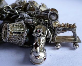 vintage solid silver charm bracelet & 29 charms.  Rare,  open,  move.  102.  8g 3