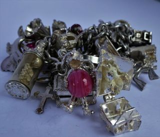 vintage solid silver charm bracelet & 29 charms.  Rare,  open,  move.  102.  8g 8