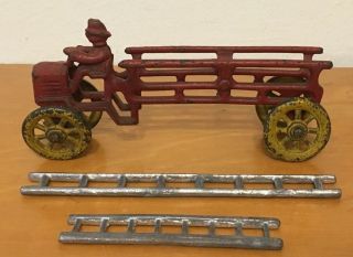 Antique Vintage Cast Iron Fire Engine Ladder Truck Toy Fixed Driver