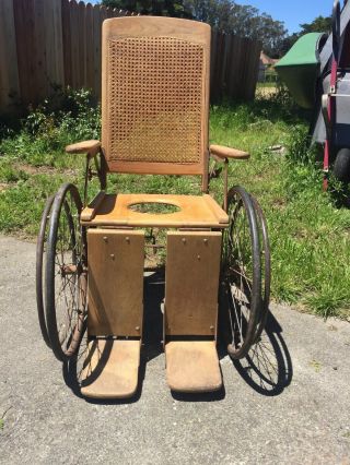 Antique Wheel Chair Commode Wicker Wood Smooth Ride Curiosity