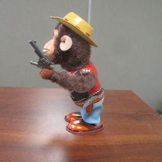 Vintage NOMURA JAPAN WIND UP TIN LITHO MONKEY THE SHERIFF TOY w/ORIG BOX 7