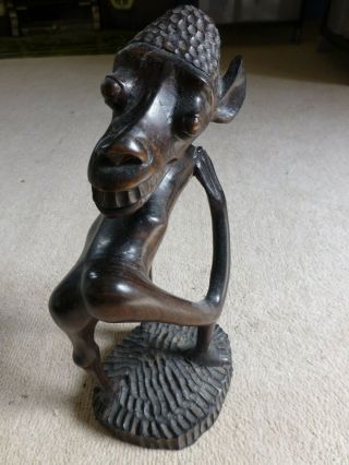 African Wood Carving.  Makonde,  Tanzania.  Ebony.  Devil Demon Figure