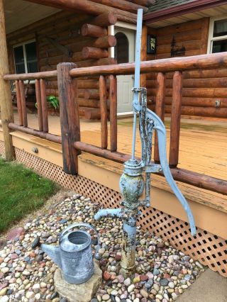 Antique Water Pump With Water Can