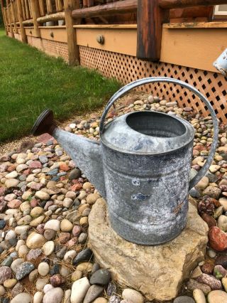 antique water pump with water can 4