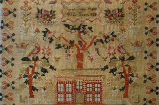 EARLY 19TH CENTURY RED HOUSE & ADAM & EVE SAMPLER BY SARAH SYKES AGED 10 - 1828 9