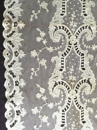 antique tambour lace curtains,  2 panels @ 75 by 25.  5 