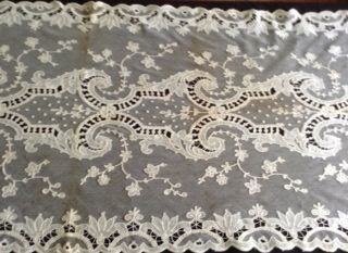 antique tambour lace curtains,  2 panels @ 75 by 25.  5 