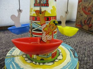 VINTAGE UNIQUE ART TIN LITHO WIND UP MUSICAL SAIL - WAY CAROUSEL 11