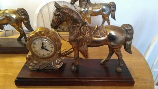 United Horse Clock United Clock Co.  Electric.  Wood Base