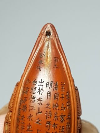 A Qing Dynasty Inscribed Olive Stone Carving Of A Boat Signed GUSHENG 1864. 11