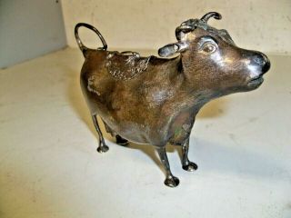 ANTIQUE STERLING COW CREAMER 12